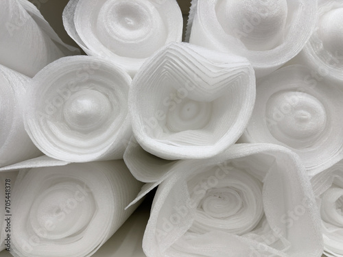 Rolls of plastic films in rolls for laminate flooring underlayment