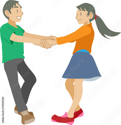 手を繋いで踊る子供達