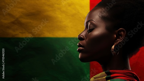 An African American Figure Against a Background of Red, Yellow, and Green. South African Flag, Black History Month, African American Culture, and the Strength of Black People. photo