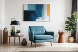 Interior home design of modern living room with blue armchair and wooden table with canvas abstract art posters on the wall