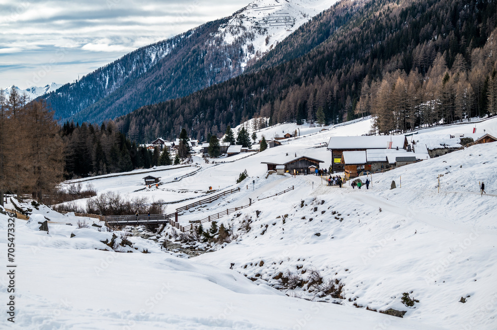 Fototapeta premium Church of Santo Spirito immersed in the snow of Val Aurina