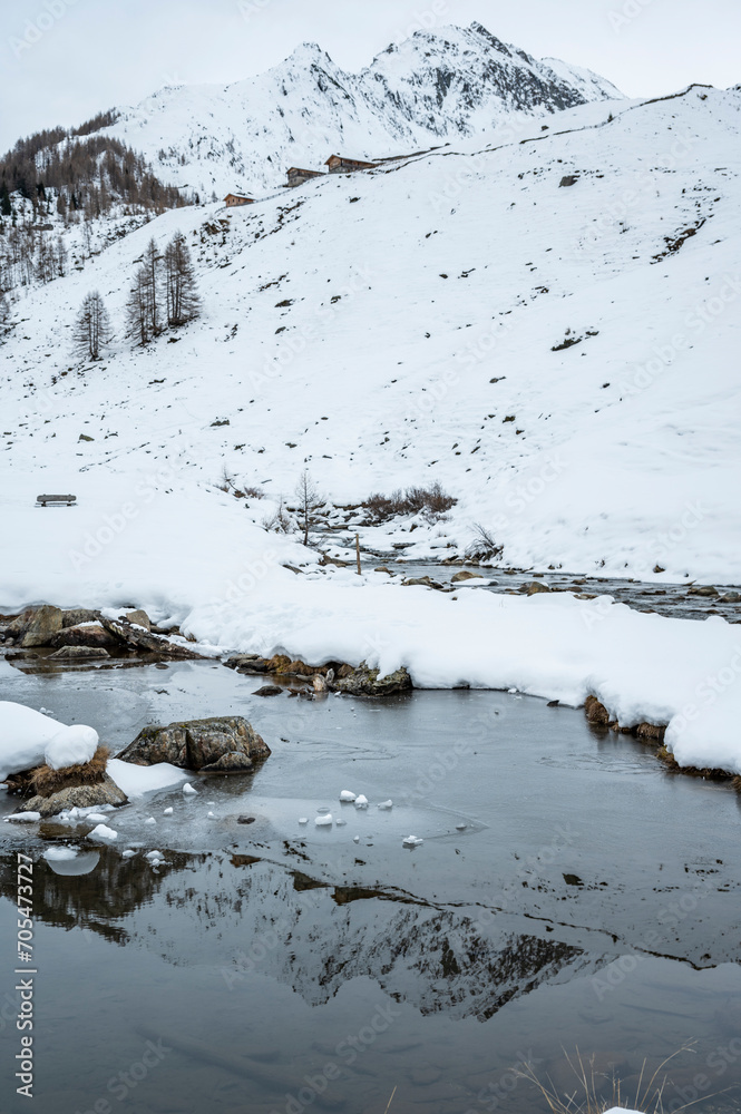 Church of Santo Spirito immersed in the snow of Val Aurina