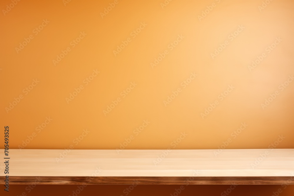 An empty table against a bright brown wall background. Wooden desk. An empty table against a bright brown wall background. Wooden desk.
