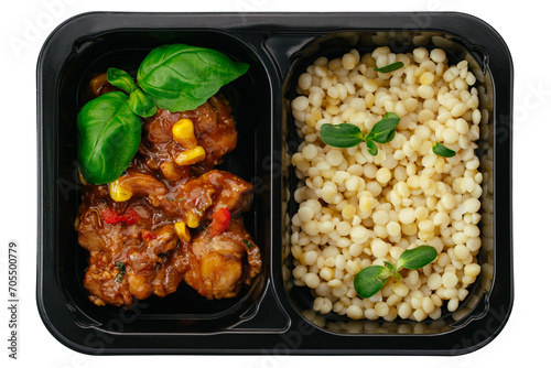 stewed meat in sauce and side dish in lunch box on white backgro