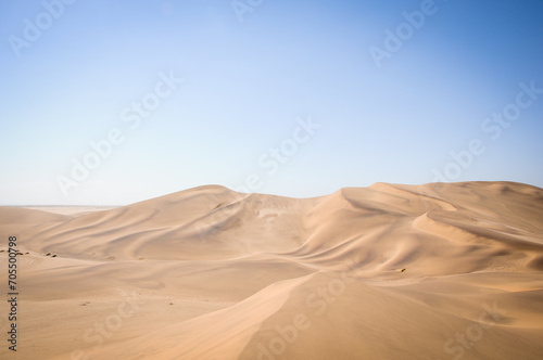 big sand dunes under blue sky in namibia