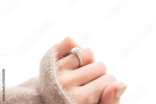 Halo Diamond Ring on Woman's Closed Hand photo