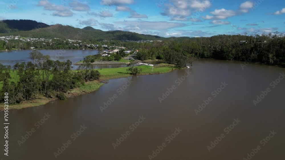 Oxenford, Gold Coast, 4 January 2024 - Aerial views of the Coomera River approaching the Causeway with receding flood waters from the January storms. Oxenford, Gold Coast, 4 January 2024 - Aerial views of the Coomera River approaching the Causeway with receding flood waters from the January storms.
