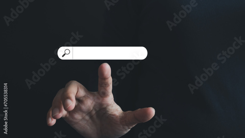 SEO Search engine optimization, Search technology, client using a finger point to search for information, using website search bar to find data, information or shopping online.
