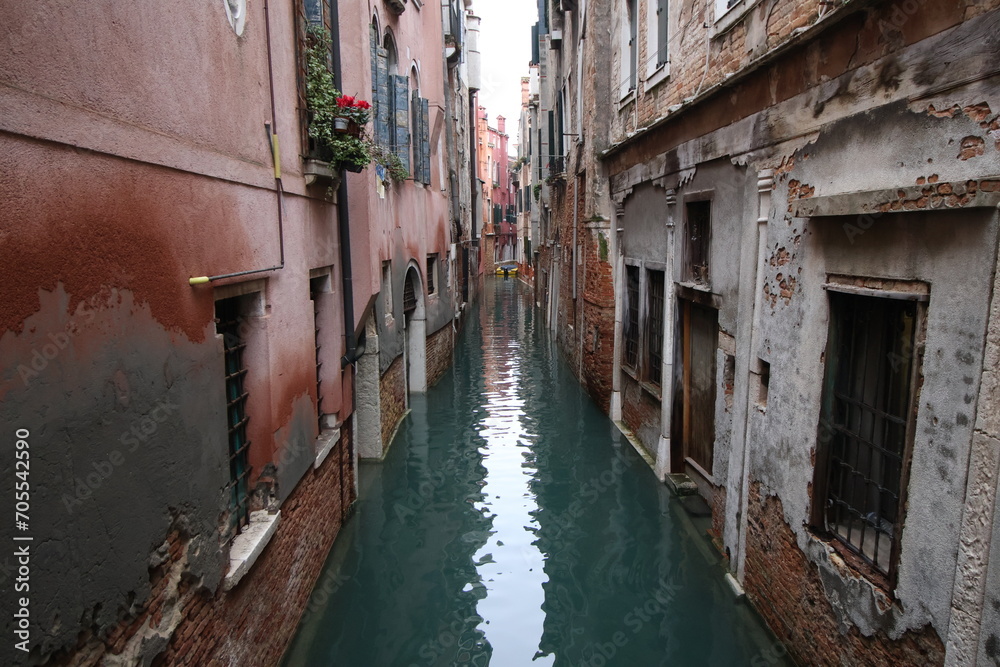 Picturesque canal between historical buildings in Venice