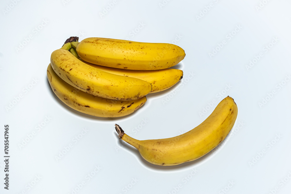 Ripe bananas isolated on a white background. Foodstuffs Ripe bananas isolated on a white background. Foodstuffs