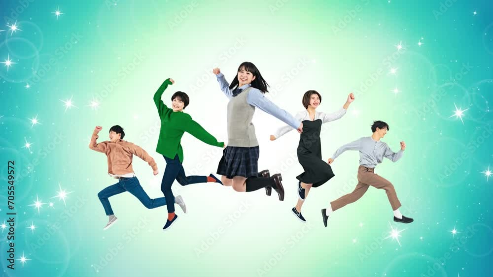 ジャンプする若者のグループ