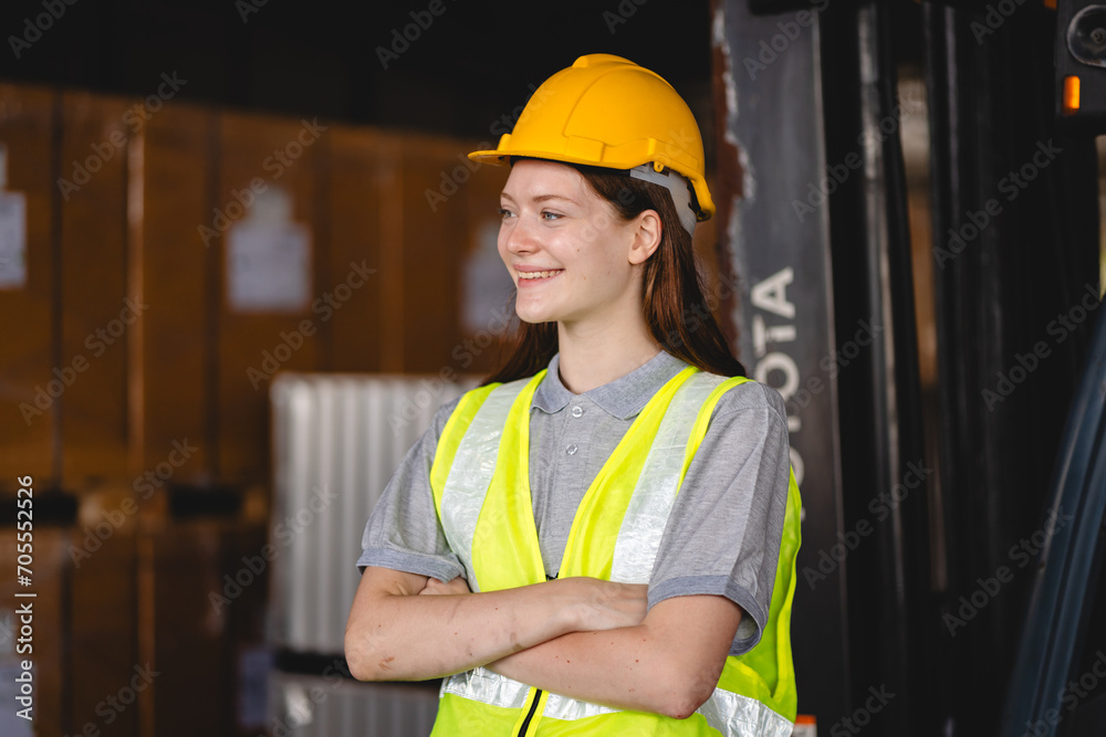 Portrait female professional engineer factory in protective uniform operating machine, Engineering worker in safety hardhat at warehouse industrial facilities, Heavy Industry Manufacturing Portrait female professional engineer factory in protective uniform operating machine, Engineering worker in safety hardhat at warehouse industrial facilities, Heavy Industry Manufacturing