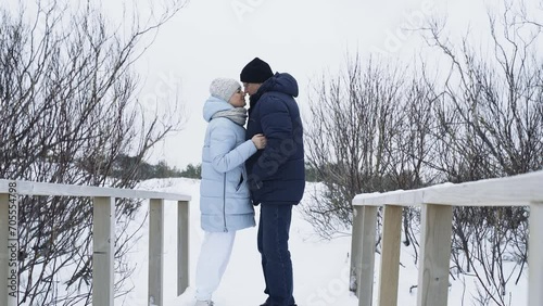 Portrait of a happy elderly couple on a frosty winter day. Valentine's Day photo