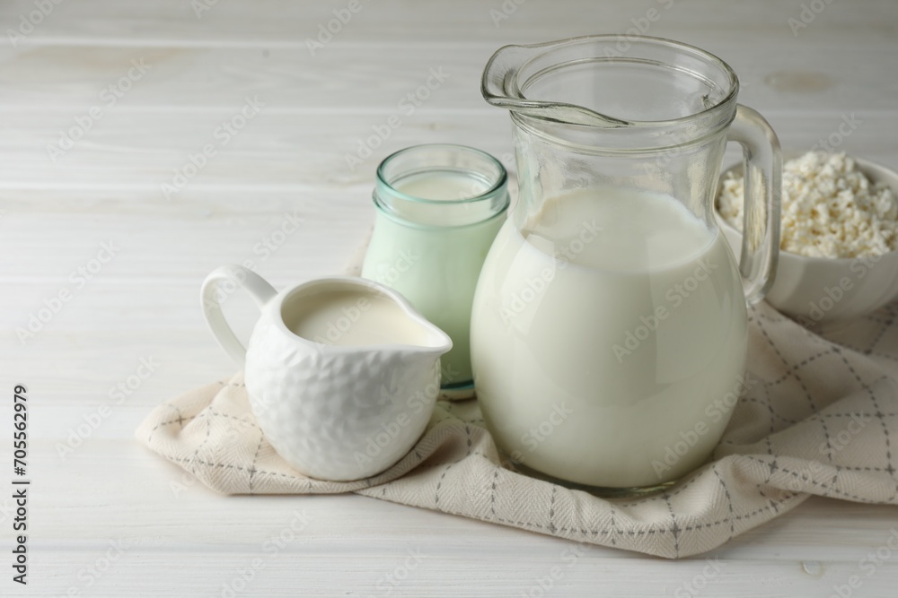 Lactose free dairy products on white wooden table, closeup Lactose free dairy products on white wooden table, closeup