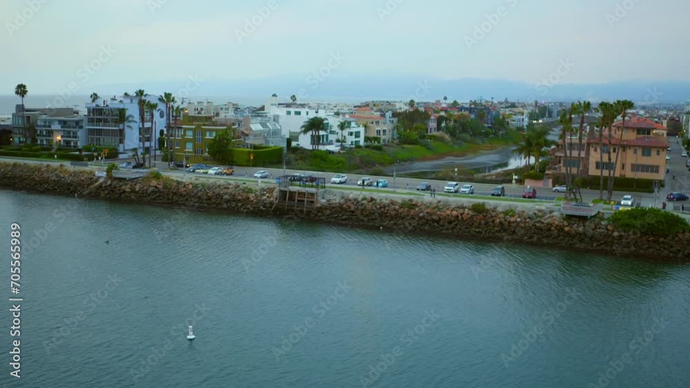 Aerial Scenic Shot Of Residential City Landscape, Drone Flying Forward Over Rippled Sea - Marina del Rey, California Aerial Scenic Shot Of Residential City Landscape, Drone Flying Forward Over Rippled Sea - Marina del Rey, California