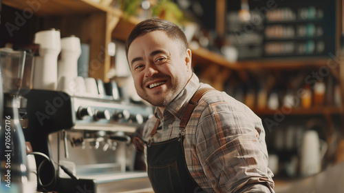 Young Man With Down Syndrome Working as a Barista in a Café photo