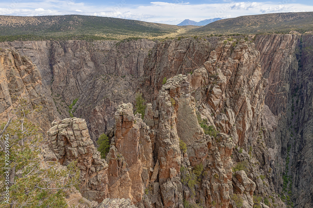 View over the Black Canyon of the Gunnison to the north rim at Rock Point on the south rim View over the Black Canyon of the Gunnison to the north rim at Rock Point on the south rim