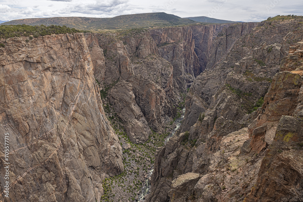The north rim of the Black Canyon of the Gunnison from top till bottom seen from Chasm View on the south rim