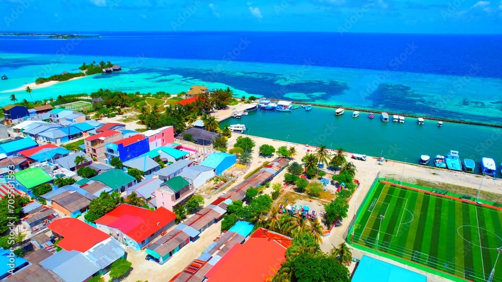 Huraa Island - Maldives - Aerial view over the place with the colored roofs