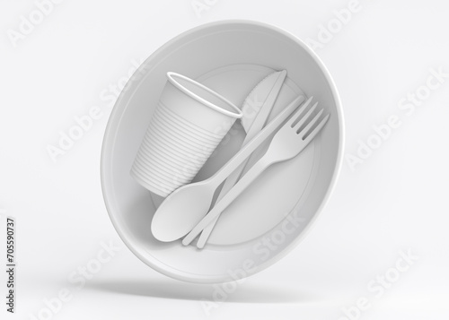 Set of disposable utensils like plate, folk, spoon,knife and cup on monochrome