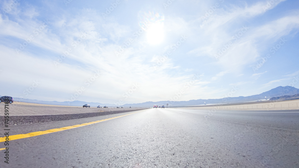 Fototapeta premium Daytime Road Trip: Nevada to California on HWY 15