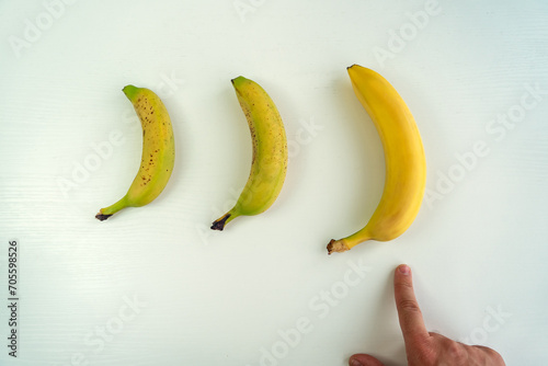 Different size and shape of Banana compare, penis Size compare concept. Men's intimate plastic surgery photo