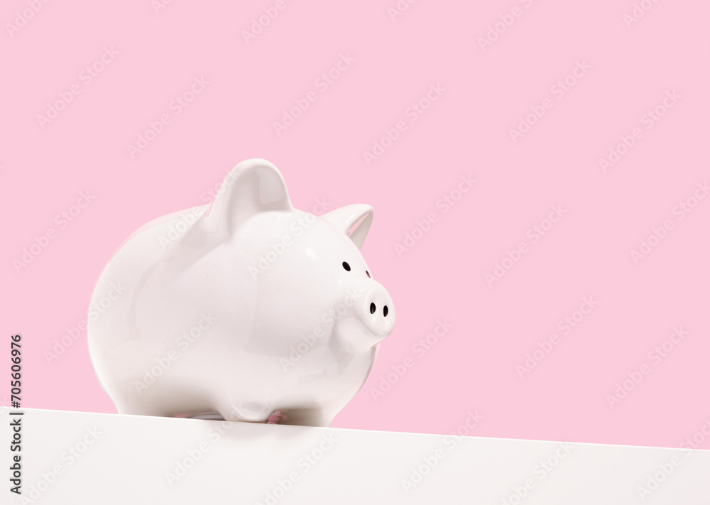 Piggy bank and money accumulation. Savings concept. Copy space for text.