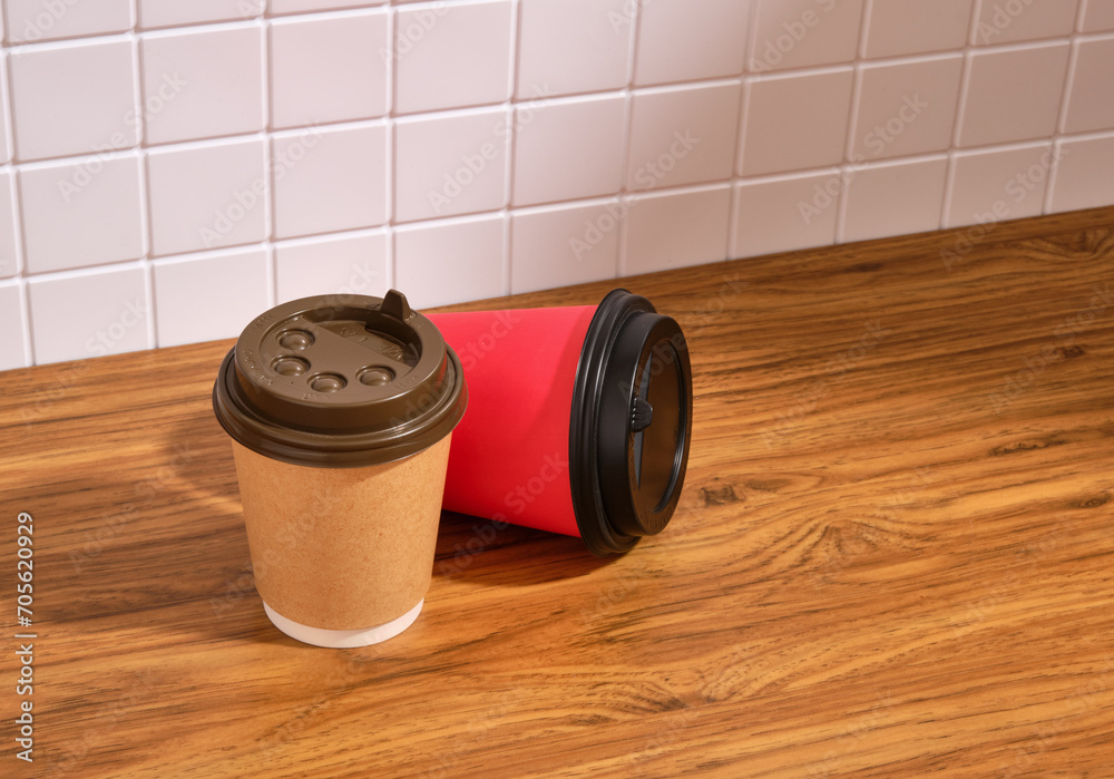 Fototapeta premium Paper coffee cups for takeout. Fresh aromatic coffee. Copy space for text.