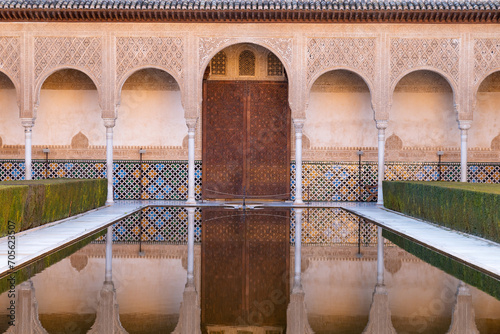 Patio de Comares with the door of the Palace of Nazaries in Granada Andalusia, Spain. photo