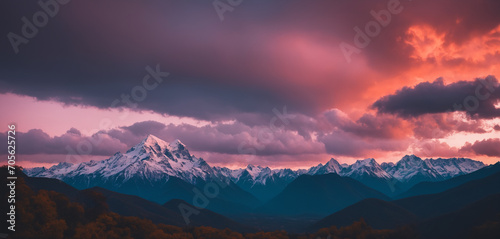 Mountain landscape with orange-teal pinkish clouds  © MohamadHosein