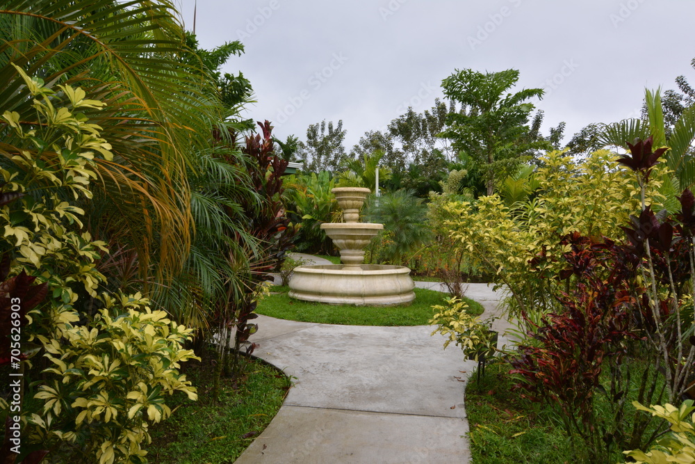 Romantic path and fountain in a tropical park in Costa Rica