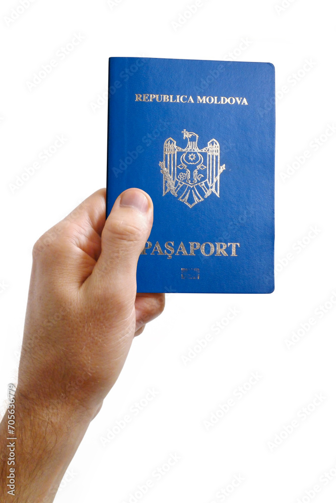 Man's hand holding a Moldovan passport Man's hand holding a Moldovan passport