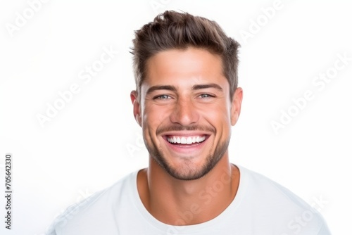 Studio Photo of Joyful Handsome Young Man Laughing. Photo Concept for Cosmetic or Dental Ads.