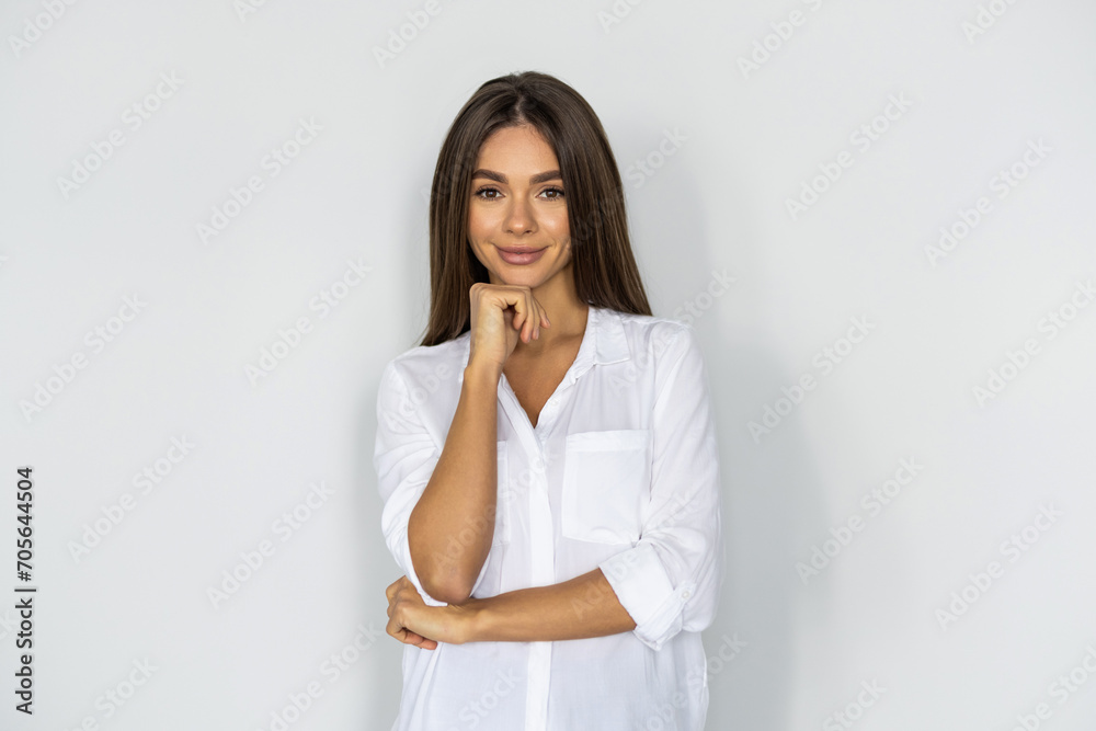 Portrait of a pensive businesswoman using mobile phone isolated over white background Portrait of a pensive businesswoman using mobile phone isolated over white background