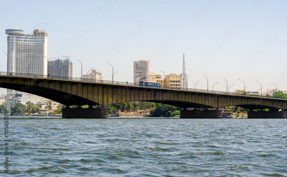 bridge over the river Nile and high houses in Cairo