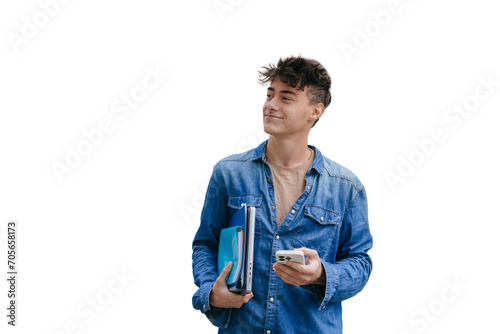 Satisfied guy in jeans shirt holding notebook, folders and phone looks aside standing against transparent background, passed exam. Smart teen boy goes to university. Education