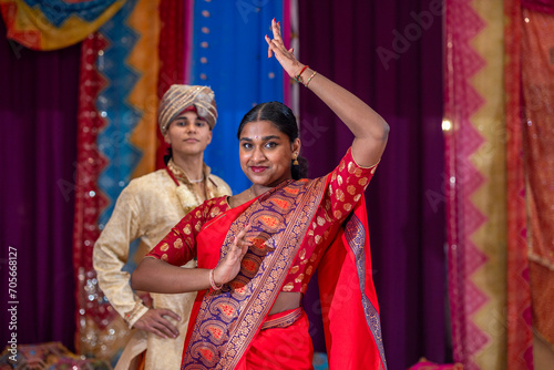 young Indian couple pose prepared for Bharathanatiyam Indian dance