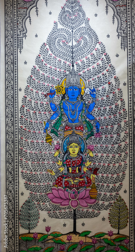  Handmade painting of lord vishnu and goddess laxmi on wooden canvas with shite background. photo