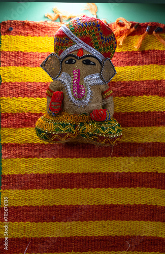 Handicraft Jute art, handmade Lord Ganesh souvenir made with jute in display at temple. photo