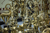 Brass metal art, Handmade Indian god Ganesh sculpture souvenir made with brass with blur background. Selective focus.