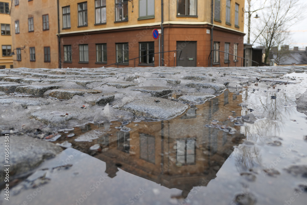 Close up of a puddle in city
