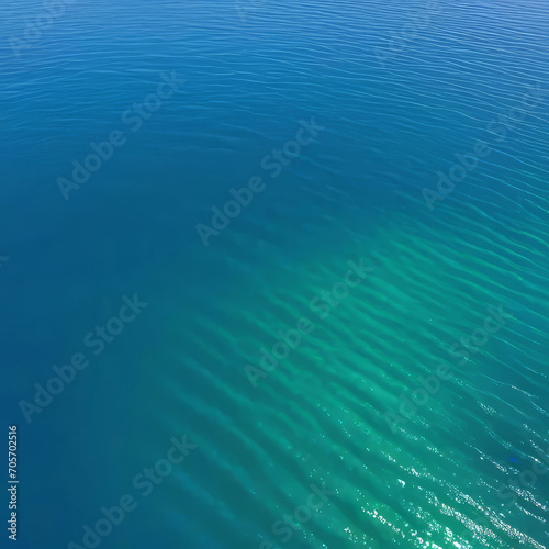 Ocean surface on an island in California with gentle ripples on the surface and refraction of light, clear water, stones at the bottom of the sea, clean environment concept,