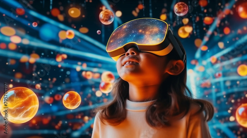 Little asian girl astronomer captivated by wonders of space through holographic VR at home photo