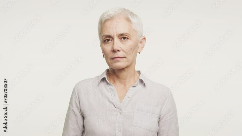 Concerned Senior Woman Portrait on White Background