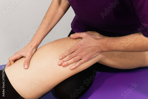Physiotherapist massaging a patient