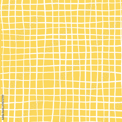 Hand drawn yellow plaid pattern. Check, square doodle background. Line art freehand grid. Crossing white stripes brush stroke. Notebook Texture. Abstract Psychedelic print with Wavy Doodle Stripes photo