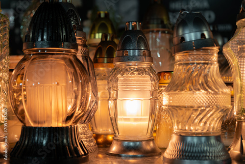 Photography Cemetery grave candle glass lanterns, znicz illuminated at night
