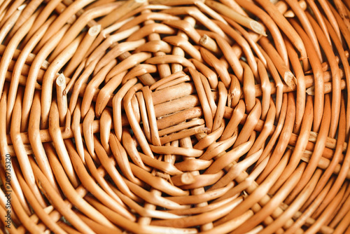 Wicker basket texture. Round circle wicker pattern. Handmade craft background. Wooden straws design.