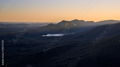 Caesars Head overlook looking towards Table Rock at sunset in South Carolina.