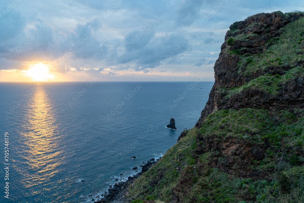 Sunset over the ocean from a hiking trail at madeira island